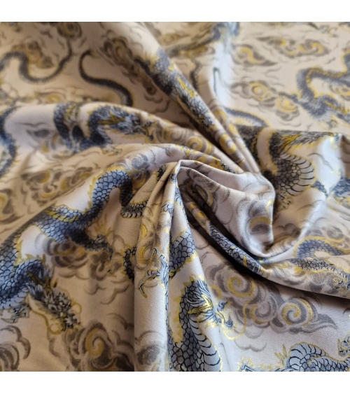 Japanese fabric 'Flying dragons' in ivory. 100% cotton.
