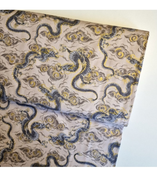 Japanese fabric 'Flying dragons' in ivory. 100% cotton.