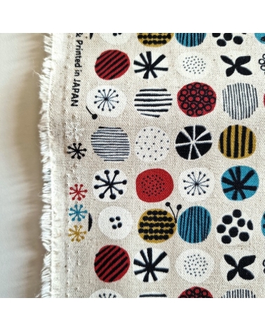 apanese canvas with coloured circles and Nordic motifs on an ivory background