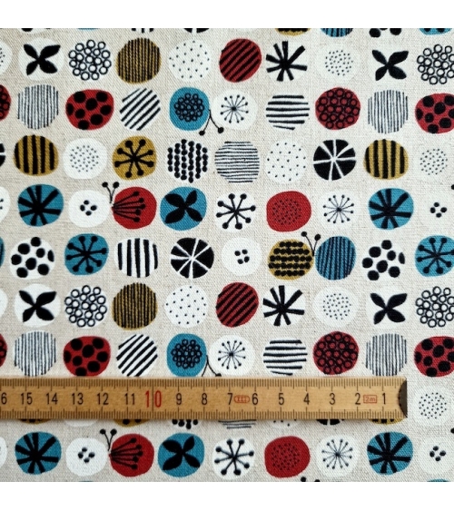 apanese canvas with coloured circles and Nordic motifs on an ivory background