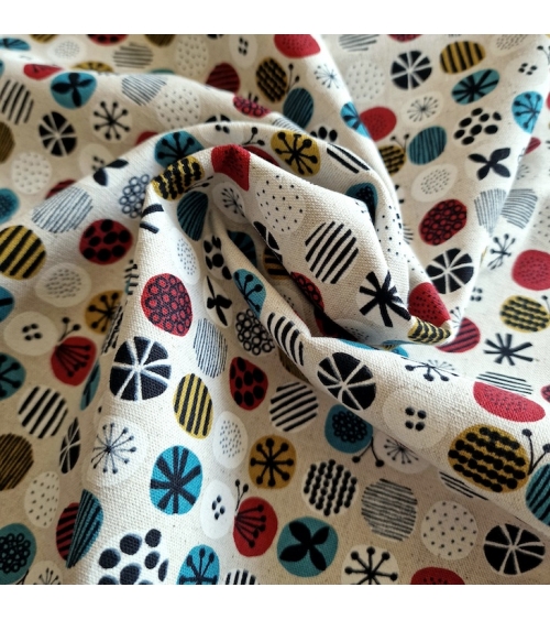 apanese canvas with coloured circles and Nordic motifs on an ivory background