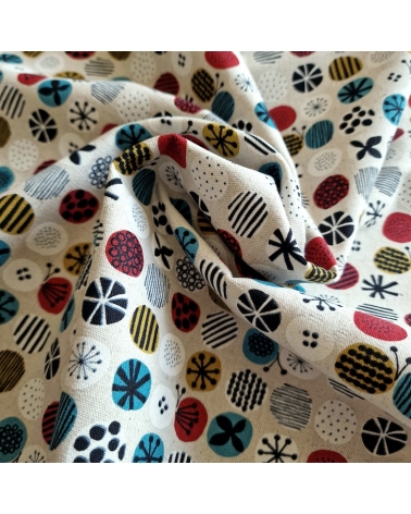 apanese canvas with coloured circles and Nordic motifs on an ivory background