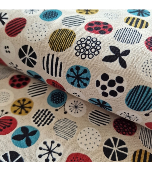 apanese canvas with coloured circles and Nordic motifs on an ivory background