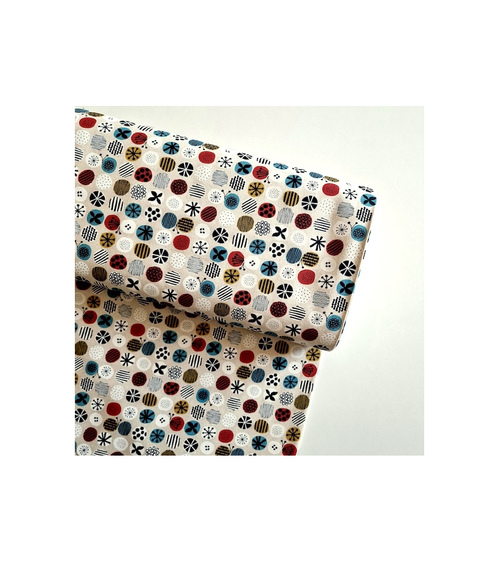 apanese canvas with coloured circles and Nordic motifs on an ivory background