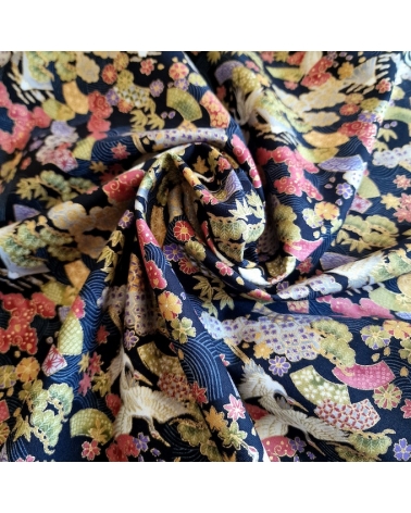 Japanese Fantasy fabric with mini motifs on black background.