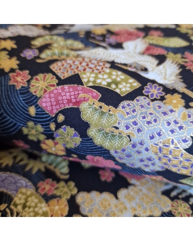 Japanese Fantasy fabric with mini motifs on black background.