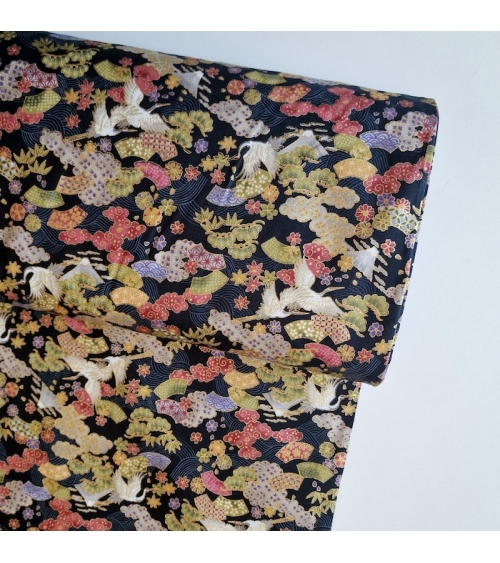 Japanese Fantasy fabric with mini motifs on black background.