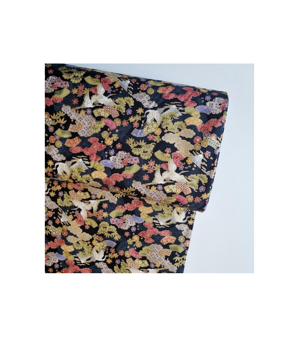 Japanese Fantasy fabric with mini motifs on black background.