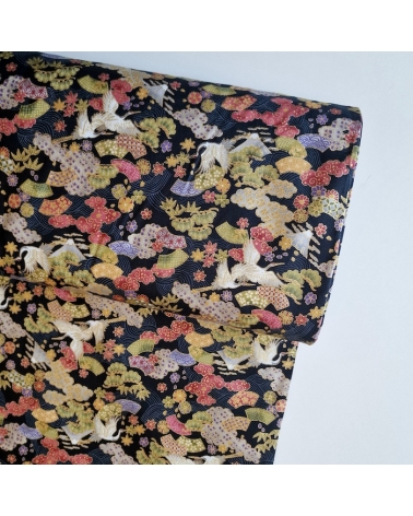 Japanese Fantasy fabric with mini motifs on black background.