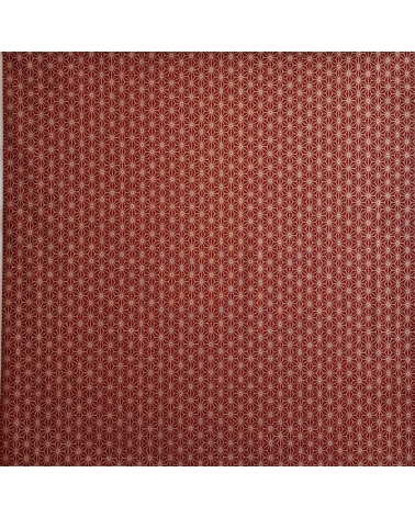 Japanese cotton fabric with golden asanohas over maroon