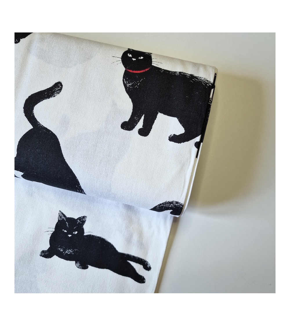 Tela de loneta japonesa. Gatos negros sobre fondo blanco.