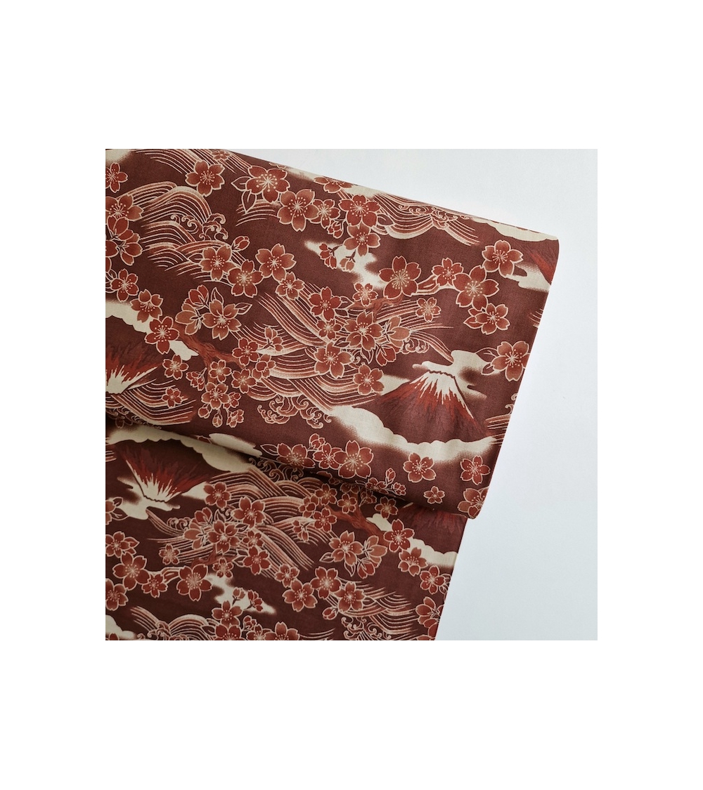 Japanese fabric ‘Tatoo: Fujisan to sakura’ in rust red. 100% cotton.
