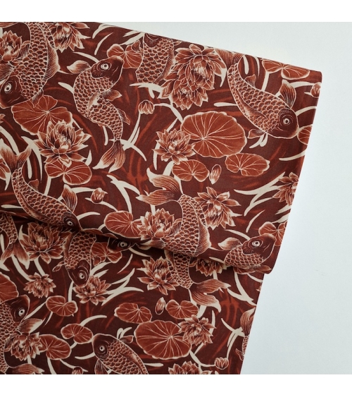 Japanese fabric ‘Tatoo: Koi fish’ in rust red. 100% cotton.