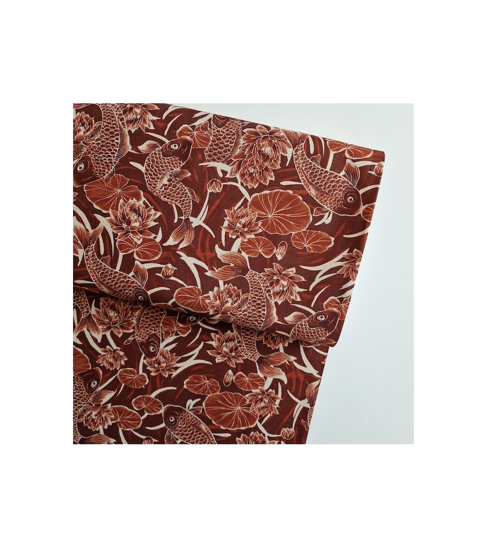 Japanese fabric ‘Tatoo: Koi fish’ in rust red. 100% cotton.