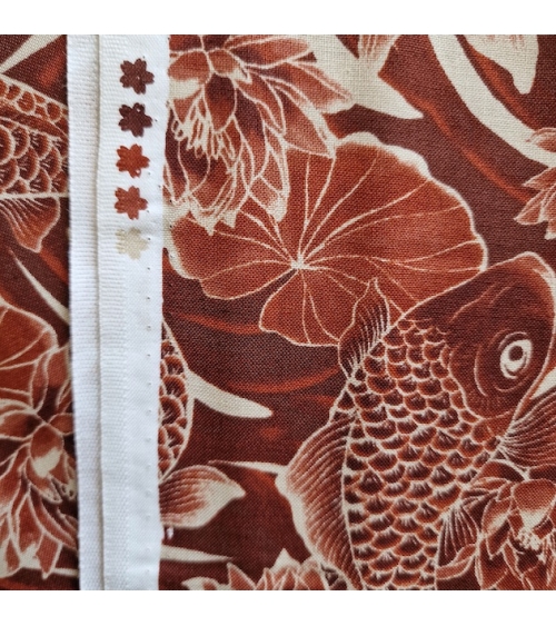 Japanese fabric ‘Tatoo: Koi fish’ in rust red. 100% cotton.
