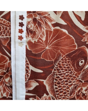 Tela japonesa "Tatoo: Carpas koi" en rojo óxido.