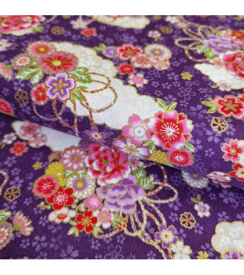 Japanese cotton fabric of clouds and flowers in violet with golden details