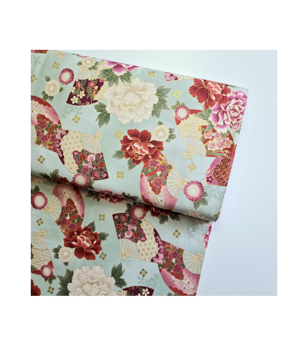 Japanese cotton fabric 'Fans and multicolor flowers' in mint green.