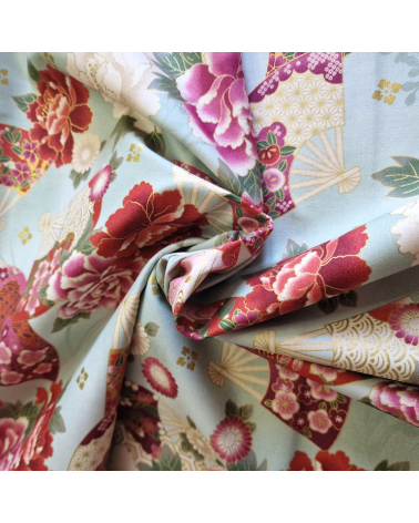 Japanese cotton fabric 'Fans and multicolor flowers' in mint green.